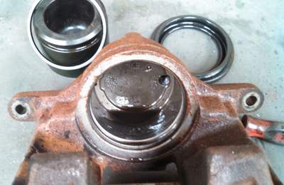 Example of how flushing brake fluid after caliper installation can ruin a brake job. After four months, dirty brake fluid caused the seal to leak. Image courtesy of Undercar Express LLC.