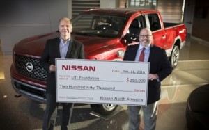 Nissan North America executives Warren DeBardelaben, Director, Dealer Support, (L) and Wally Burchfield, Vice President, Aftersales Division, present a check for $250,000 to the UTI Foundation to fund scholarships for students who wish to pursue careers as automotive technicians. Nissan has supported the UTI Foundation with more than $1.2 million in scholarship donations over the past seven years.