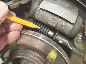 Brake return springs not only retract the wheel cylinder pistons, they also allow the brake shoe’s self-adjusters to work correctly. Drum brakes ­usually require special tools to remove and install hold-down and return springs.