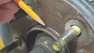 Soak the axle hub with quality penetrating oil before removing the brake drum. A light coat of synthetic caliper grease ­applied to the hub will help prevent corrosion after the drum is ­reinstalled.